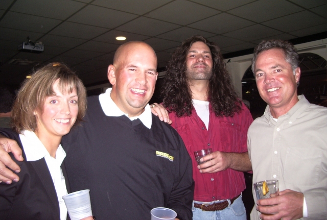 Jon Nicholas with his wife, Mark Neiswinder and John Stryker